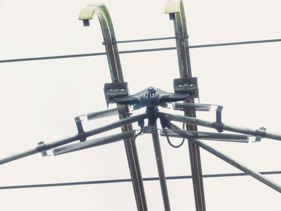 Pantograph of a train in contact with overhead electrification wires